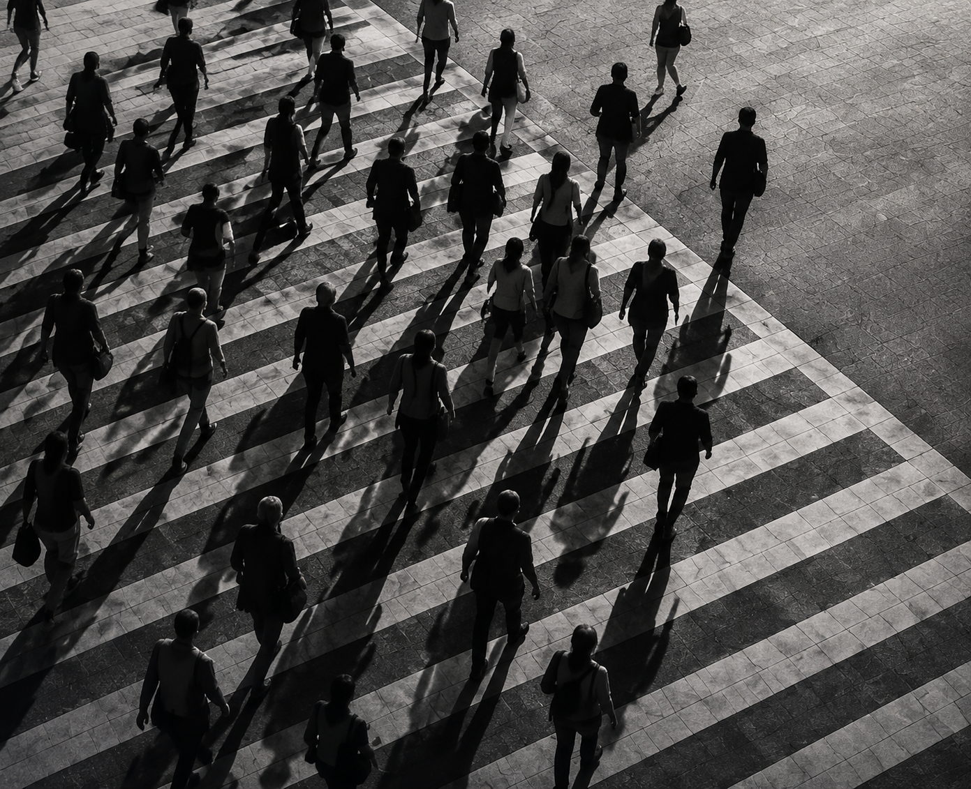 People moving together across an urban plaza